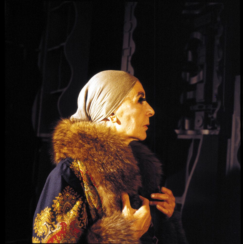 Profile of the artist in her winter furs.