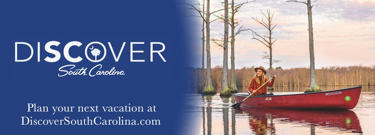 Discover South Carolina ad featuring a woman canoeing.