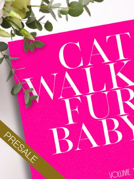 Cover image of the second CatWalk FurBaby Coffee Table book staged beside a plant